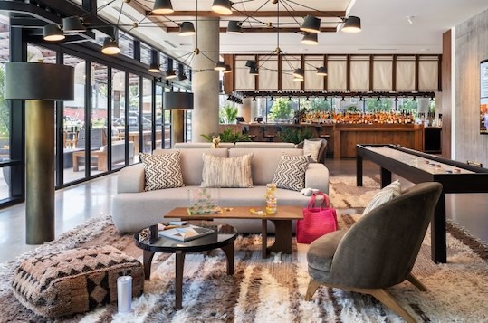 Cozy hotel lobby with modern furniture.