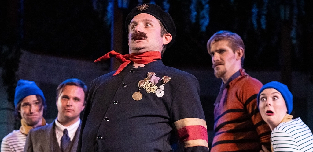 Silly looking policeman with medals puffing out chest on stage